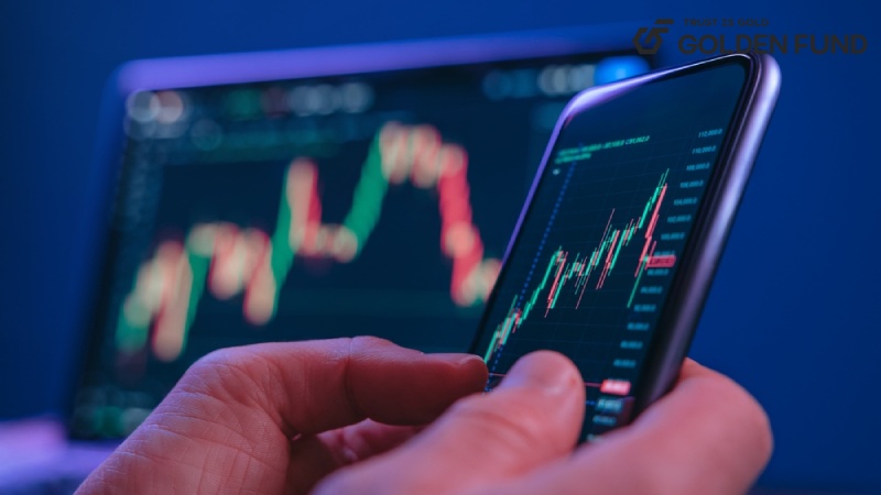 Close-up,of,hands,holding,smartphone,displaying,a,stock,market,candlestick